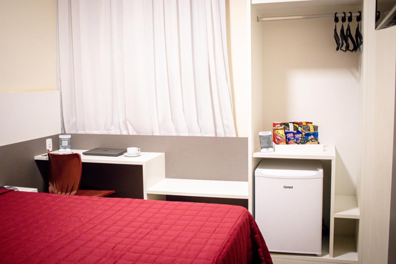 Hotel H2 Congonhas คองโกนญัส ภายนอก รูปภาพ A typical room at a capsule hotel